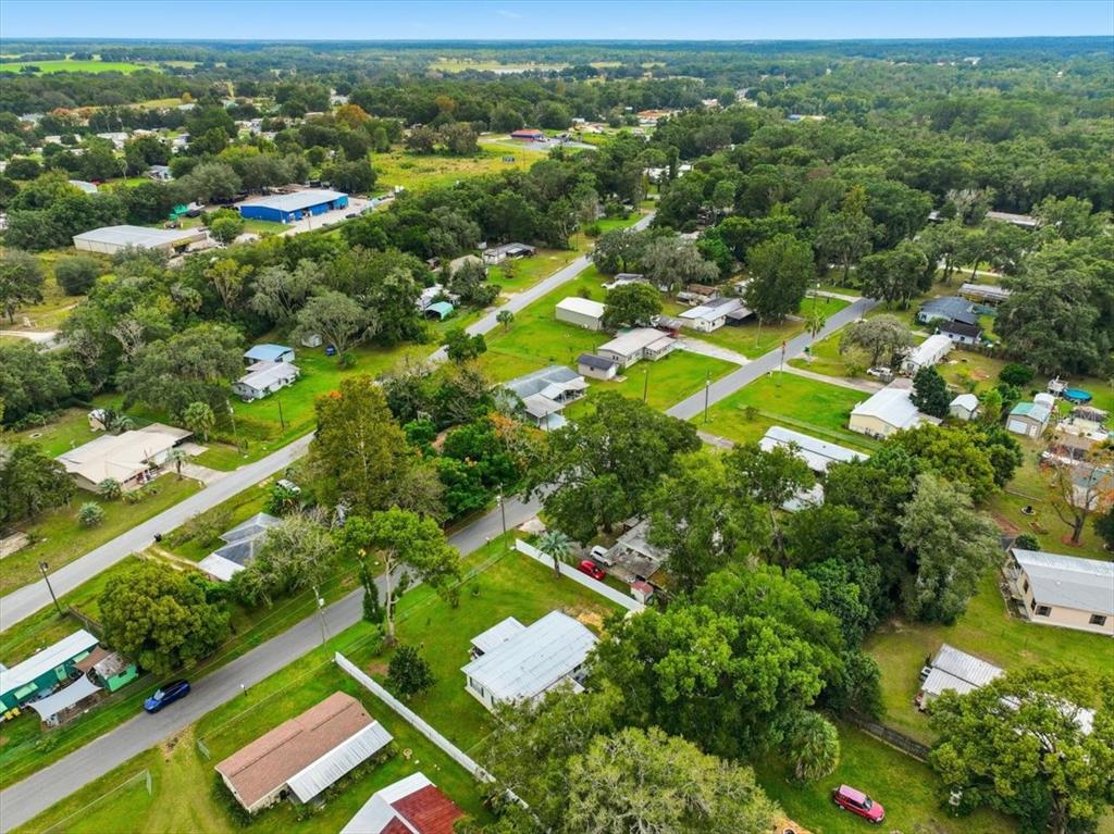 1422 North Reed Terrace Inverness, FL 34453 - Photo 33 of 39 an aerial view of residential houses with outdoor space and trees
