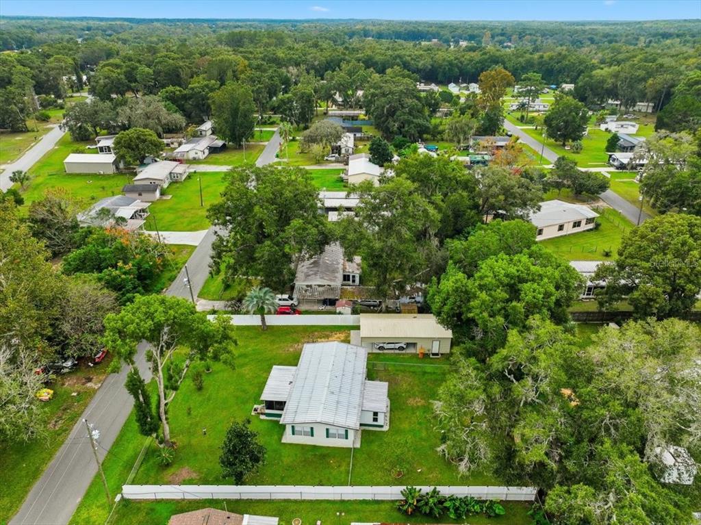 1422 North Reed Terrace Inverness, FL 34453 - Photo 36 of 39 an aerial view of residential houses with outdoor space and trees