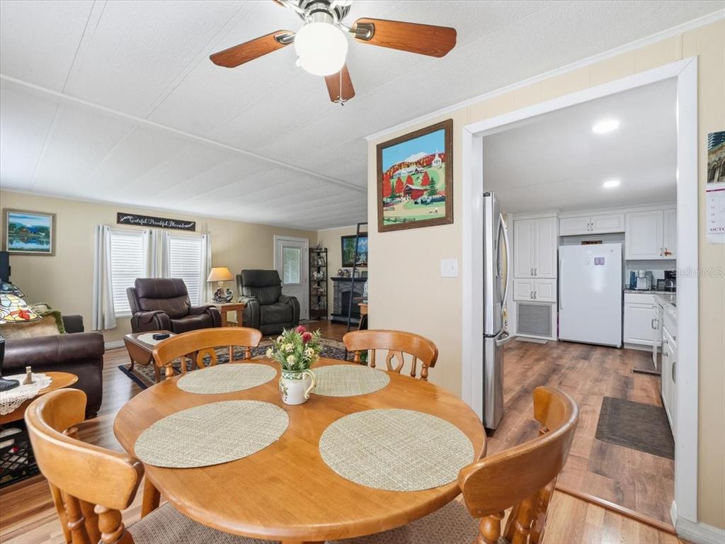 1422 North Reed Terrace Inverness, FL 34453 - Photo 10 of 39 a dining room with furniture and wooden floor