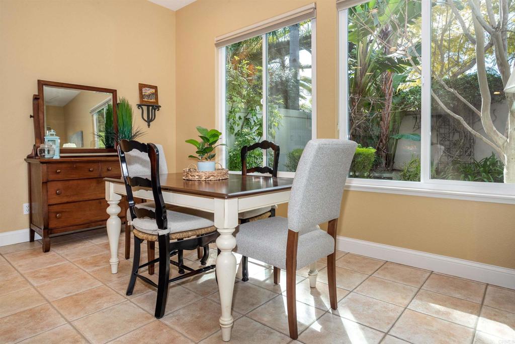 7159 Tanager Drive Carlsbad, CA 92011 - Photo 19 of 68 a dining room with furniture and window
