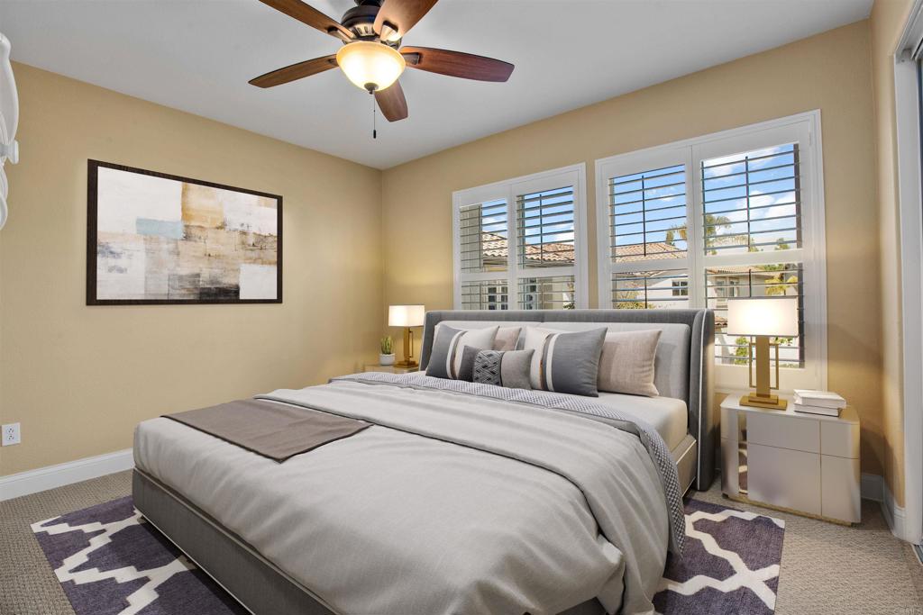 7159 Tanager Drive Carlsbad, CA 92011 - Photo 30 of 68 a bedroom with a large bed and a window