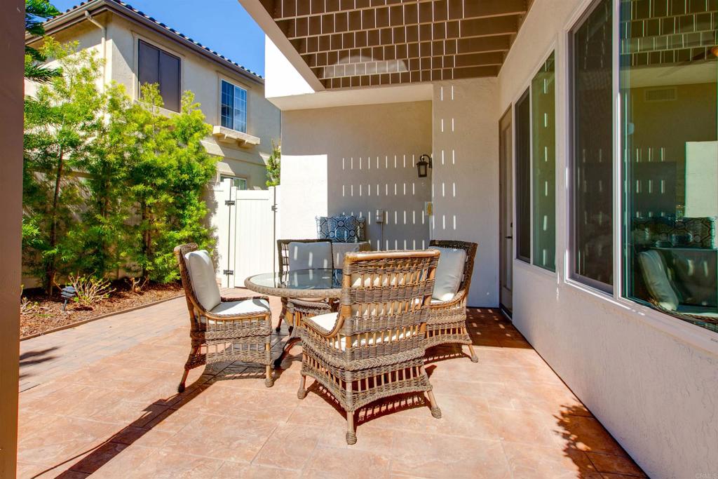 7159 Tanager Drive Carlsbad, CA 92011 - Photo 45 of 68 a view of a chair and tables in the balcony