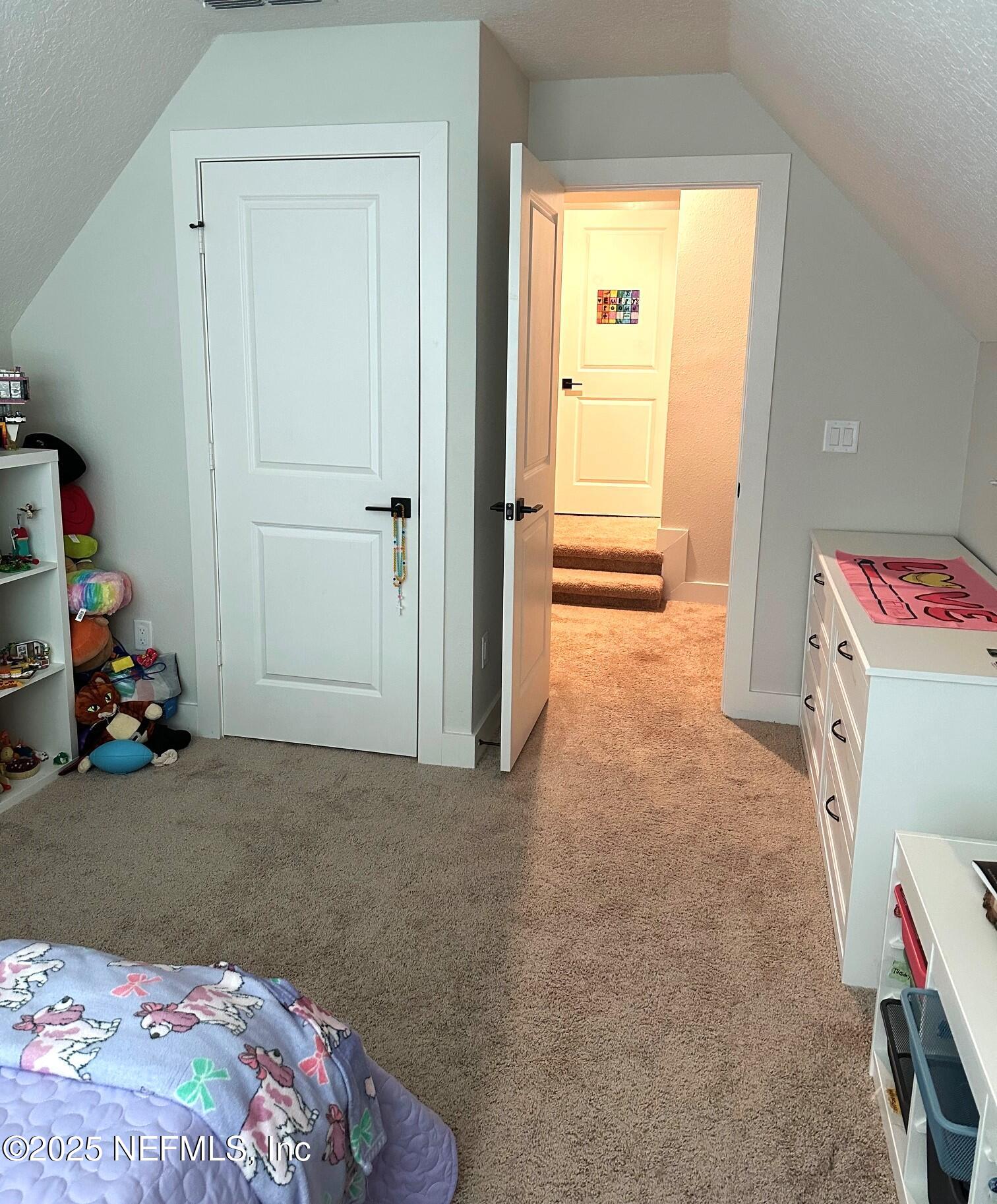 36079 Pitch Lane Hilliard, FL 32046 - Photo 25 of 35 a view of a bedroom with baby toys