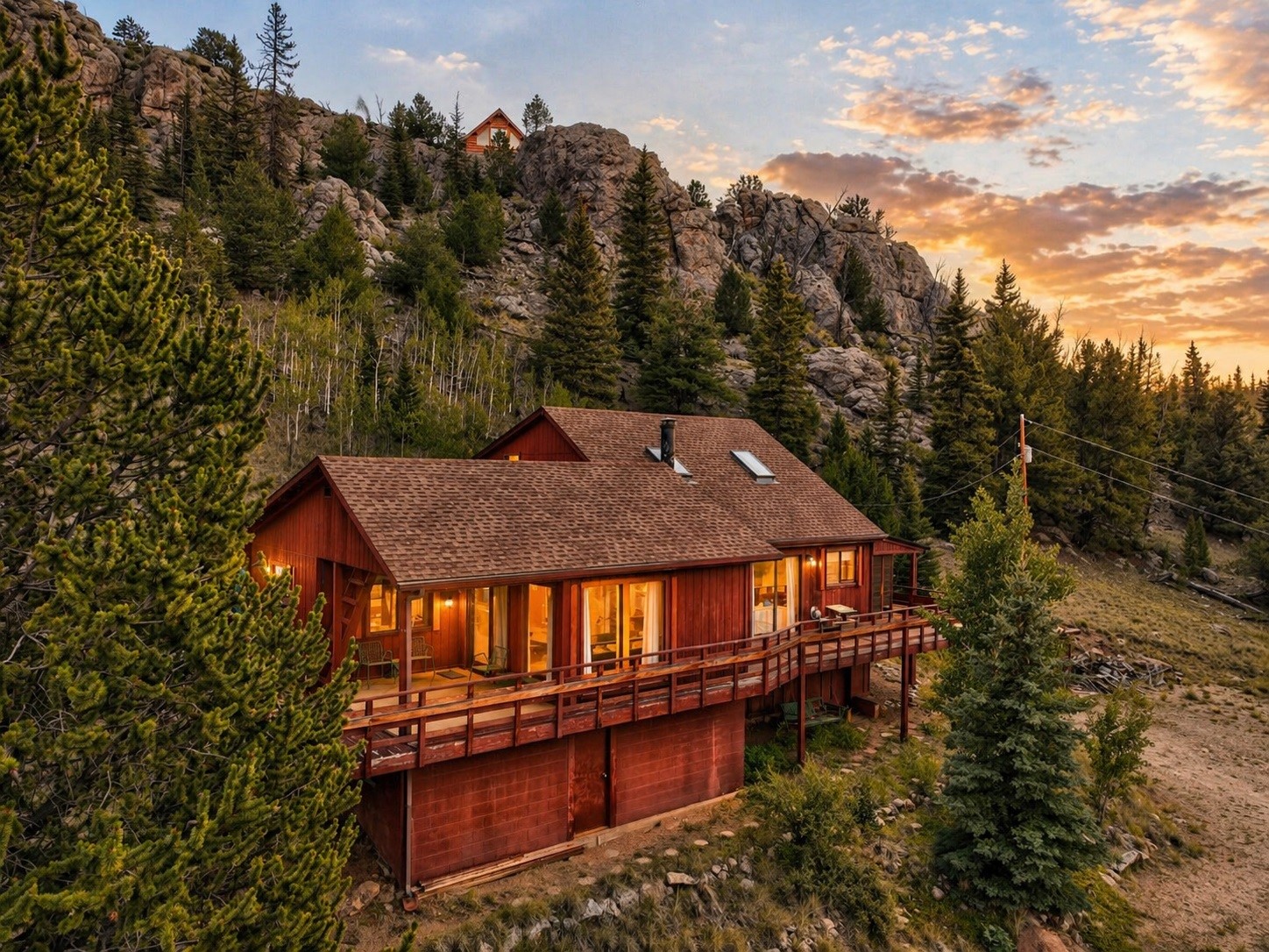 1722 Stagestop Road Jefferson, CO 80456 - Photo 1 of 26 an aerial view of a house with a yard