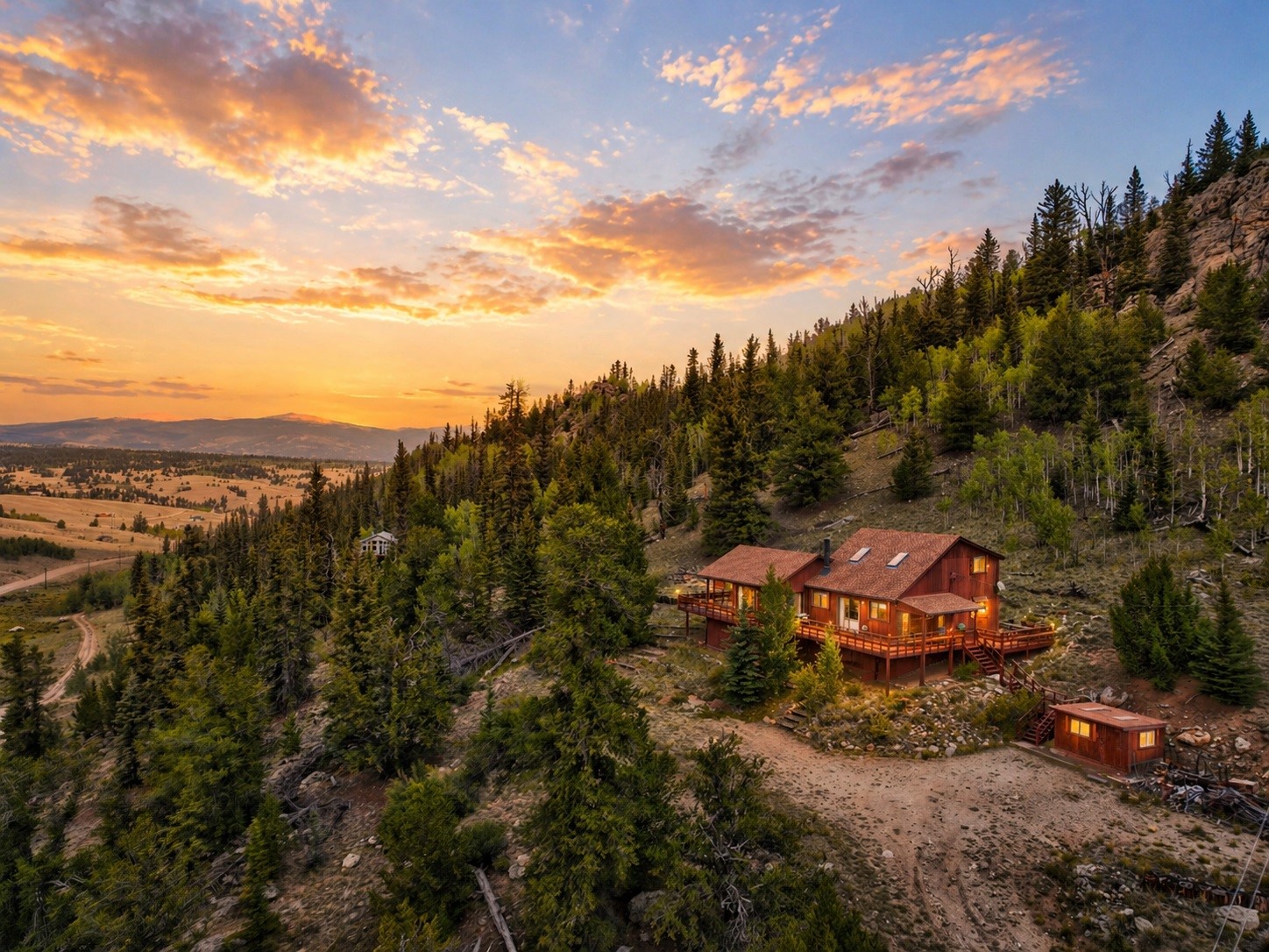 1722 Stagestop Road Jefferson, CO 80456 - Photo 2 of 26 an aerial view of a house with a garden