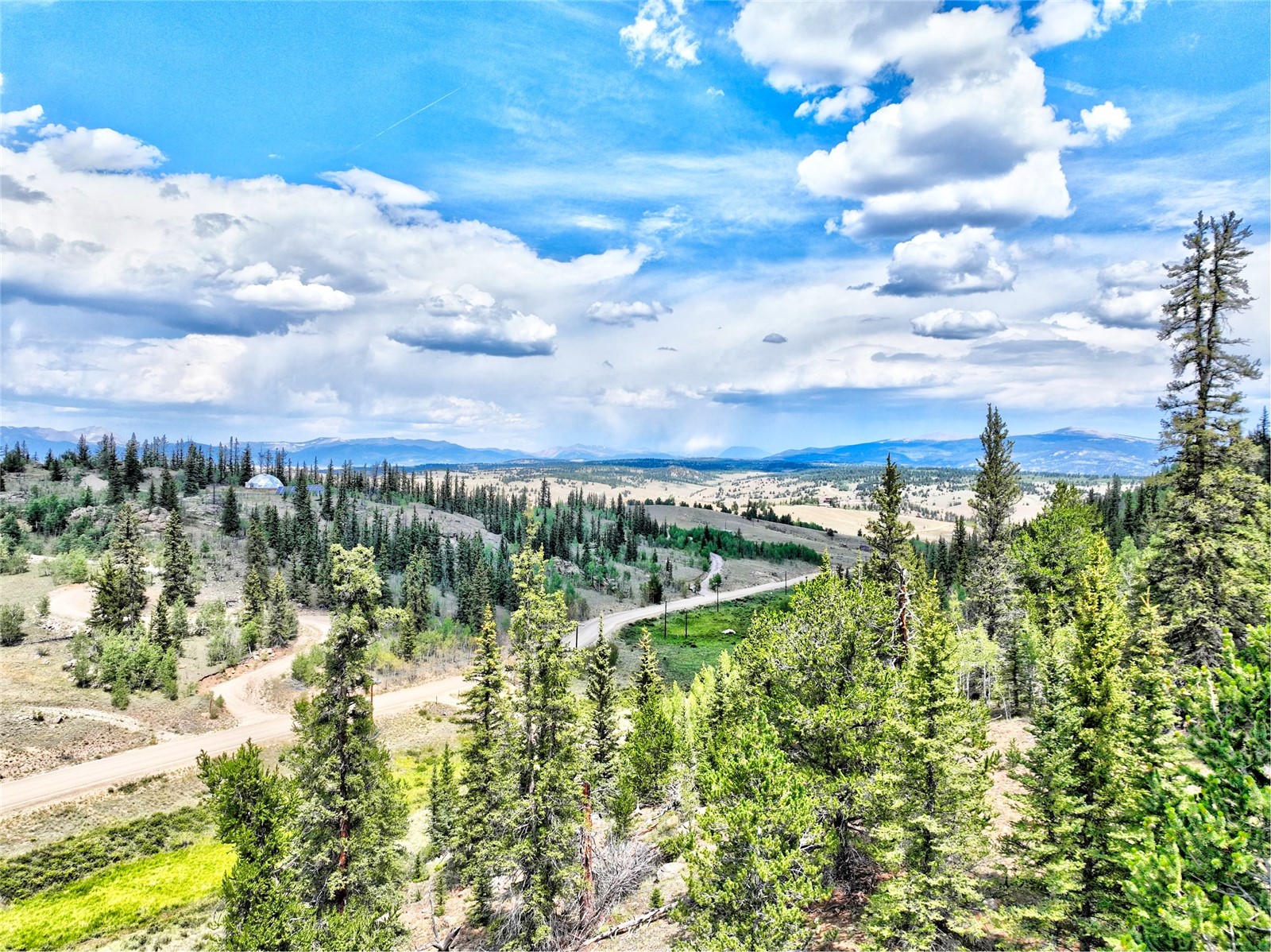 1722 Stagestop Road Jefferson, CO 80456 - Photo 21 of 26 a view of a lake from a yard