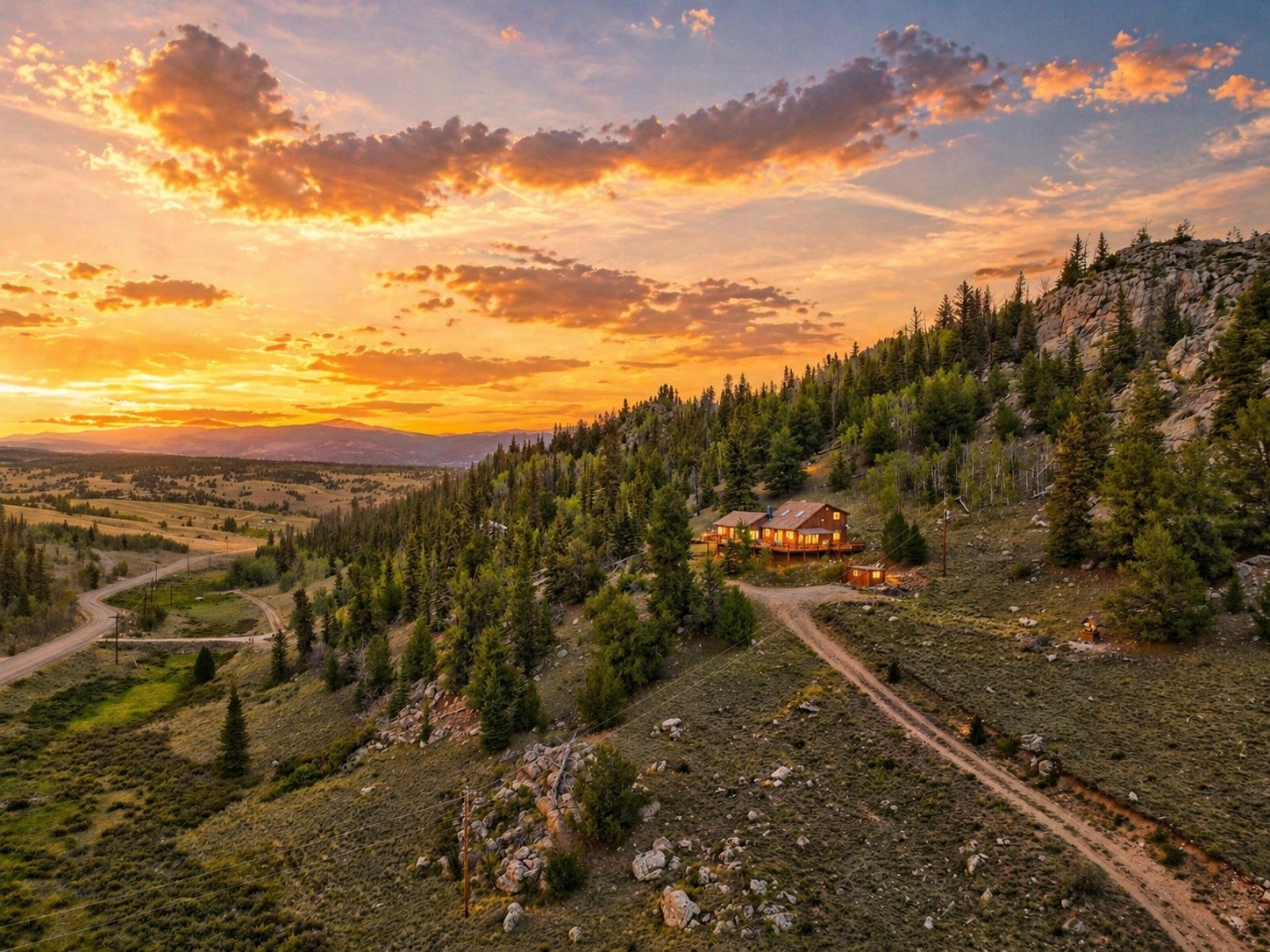 1722 Stagestop Road Jefferson, CO 80456 - Photo 3 of 26 a view of a big yard with lots of trees
