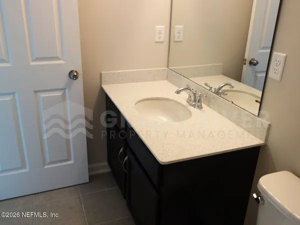 a view of a room that has a window in it