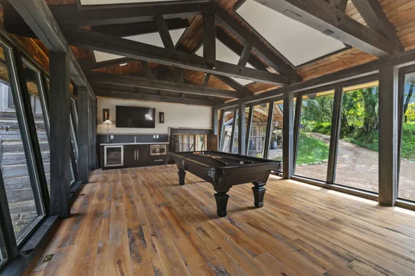 a work room with furniture and a window