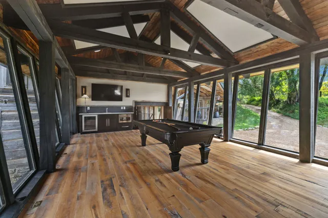 a work room with furniture and a window