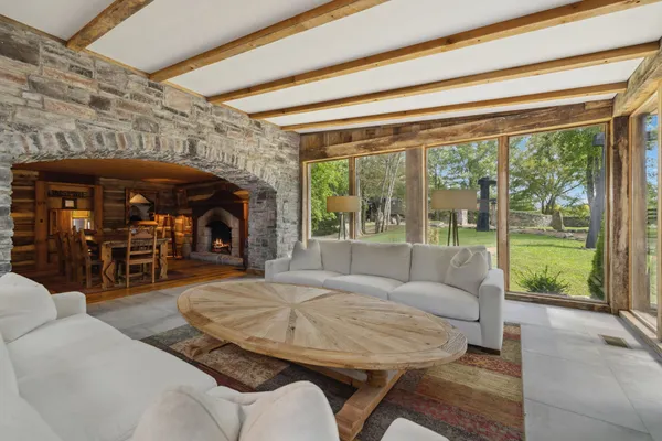 a living room with furniture and windows