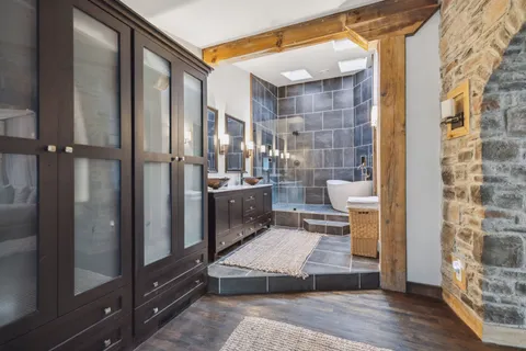 a view of a swimming pool with an outdoor seating and a yard