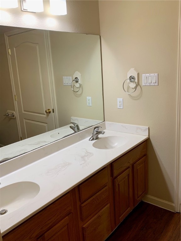 931 Moore Avenue Portland, TX 78374 - Photo 11 of 17 a bathroom with a sink and a mirror