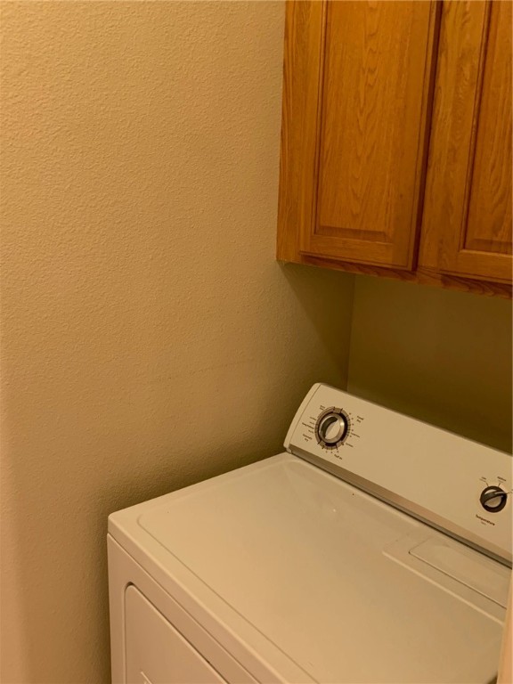 931 Moore Avenue Portland, TX 78374 - Photo 13 of 17 a utility room with dryer and washer