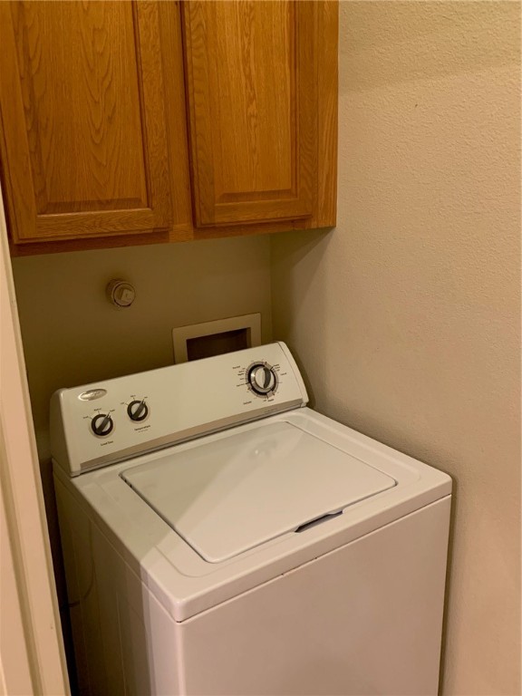 931 Moore Avenue Portland, TX 78374 - Photo 14 of 17 a utility room with dryer and washer