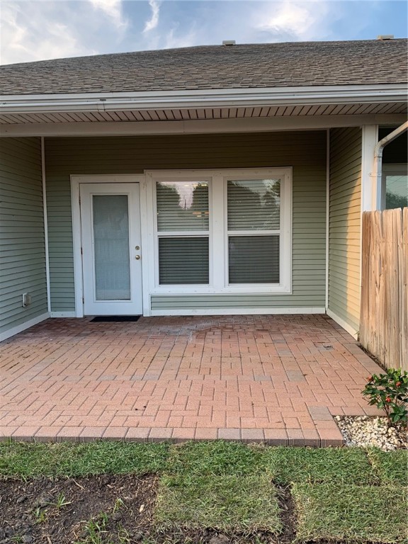 931 Moore Avenue Portland, TX 78374 - Photo 15 of 17 a front view of a house with garden