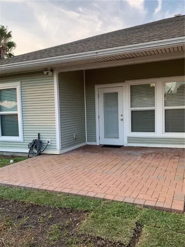 a house with yard in front of it