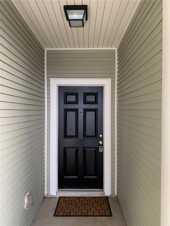 931 Moore Avenue Portland, TX 78374 - Photo 2 of 17 a view of a door of the house