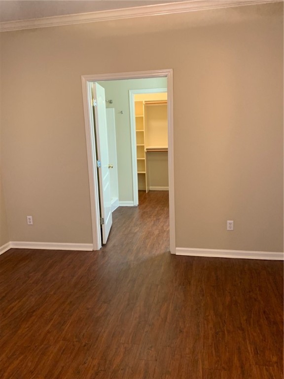 931 Moore Avenue Portland, TX 78374 - Photo 9 of 17 an empty room with wooden floor and closet
