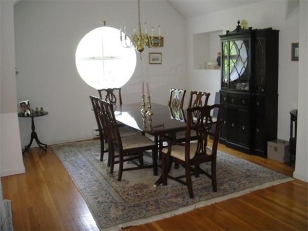 63 Garden Road, Unit G8 Wellesley, MA 02481 - Photo 6 of 12 a view of a dining room with furniture