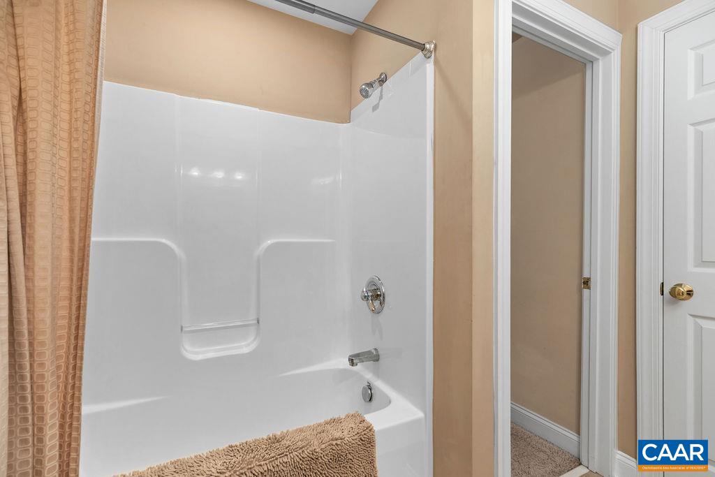 59 Timber Ridge Lane Roseland, VA 22967 - Photo 22 of 45 a bathroom with a tub and shower