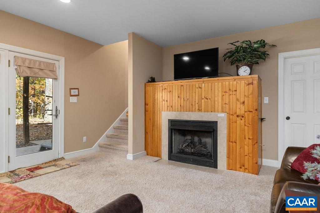 59 Timber Ridge Lane Roseland, VA 22967 - Photo 26 of 45 a living room with furniture and a fireplace