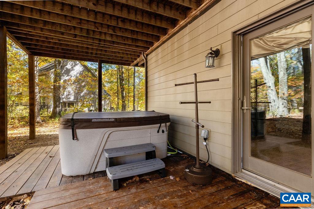 59 Timber Ridge Lane Roseland, VA 22967 - Photo 39 of 45 a living room with a wooden floor and a floor to ceiling window