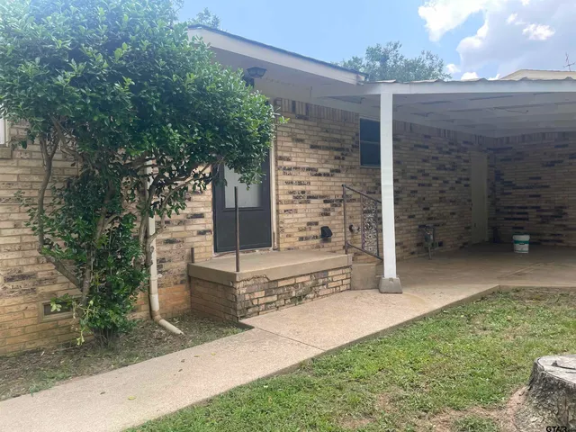 a view of house with stairs