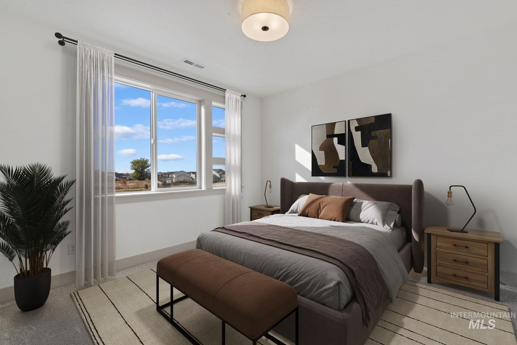 8482 West Graye Street, Unit ALPINE Meridian, ID 83646 - Photo 16 of 19 Bedroom featuring baseboards