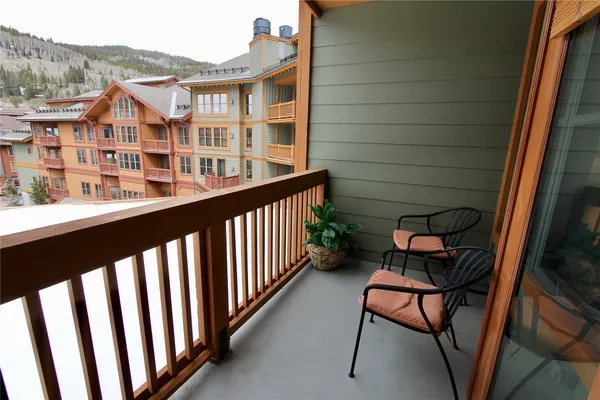 a view of a brick building from a balcony
