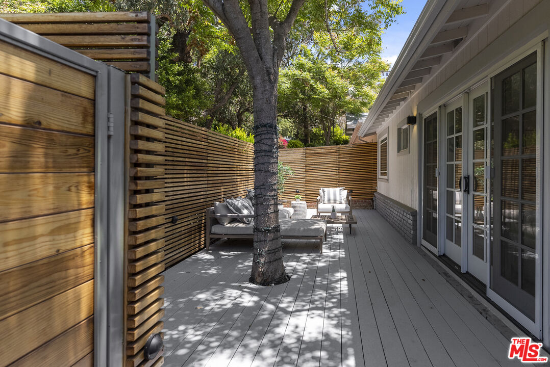 9520 Gloaming Drive Beverly Hills, CA 90210 - Photo 40 of 44 a backyard of a house with outdoor seating