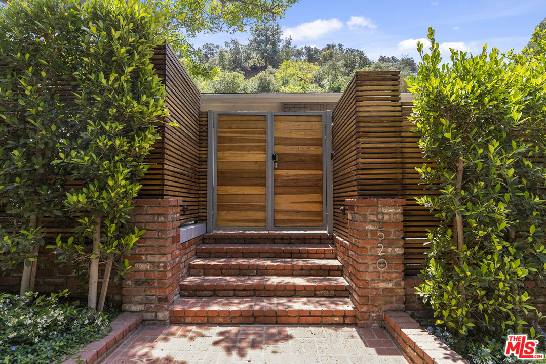 9520 Gloaming Drive Beverly Hills, CA 90210 - Photo 41 of 44 a view of a pathway of the house