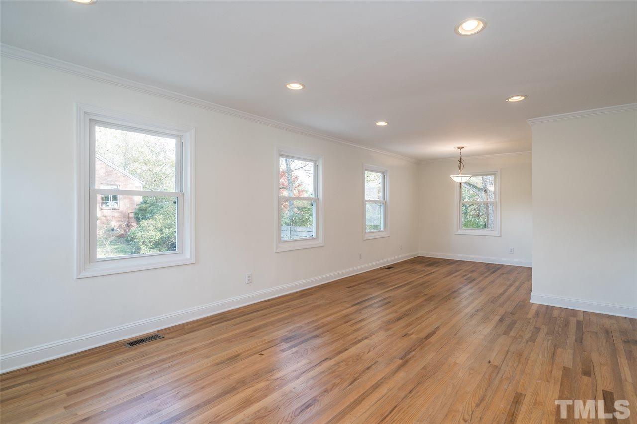 606 North King Charles Road Raleigh, NC 27610 - Photo 3 of 22 a view of an empty room and window