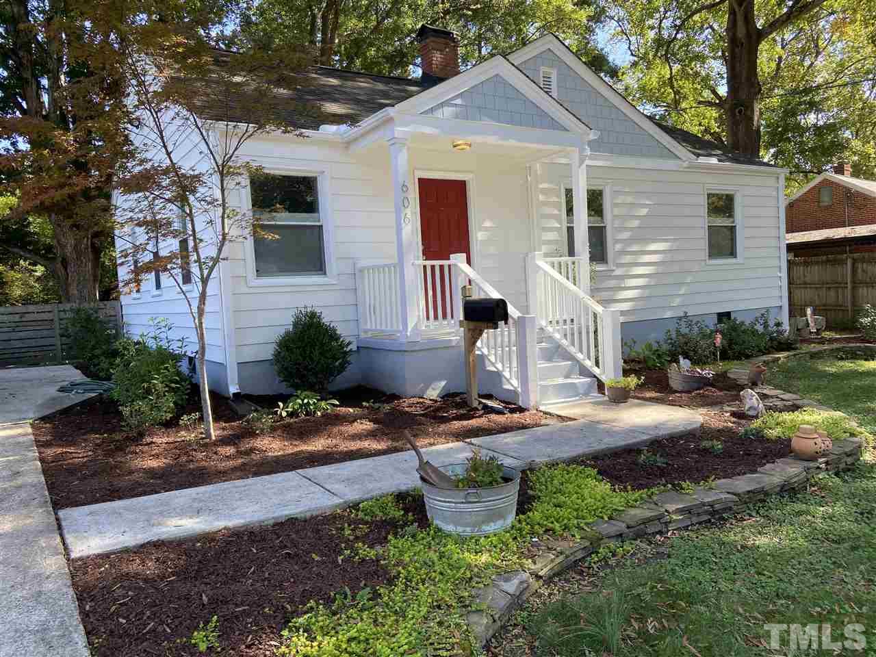 606 North King Charles Road Raleigh, NC 27610 - Photo 22 of 22 a front view of a house with garden
