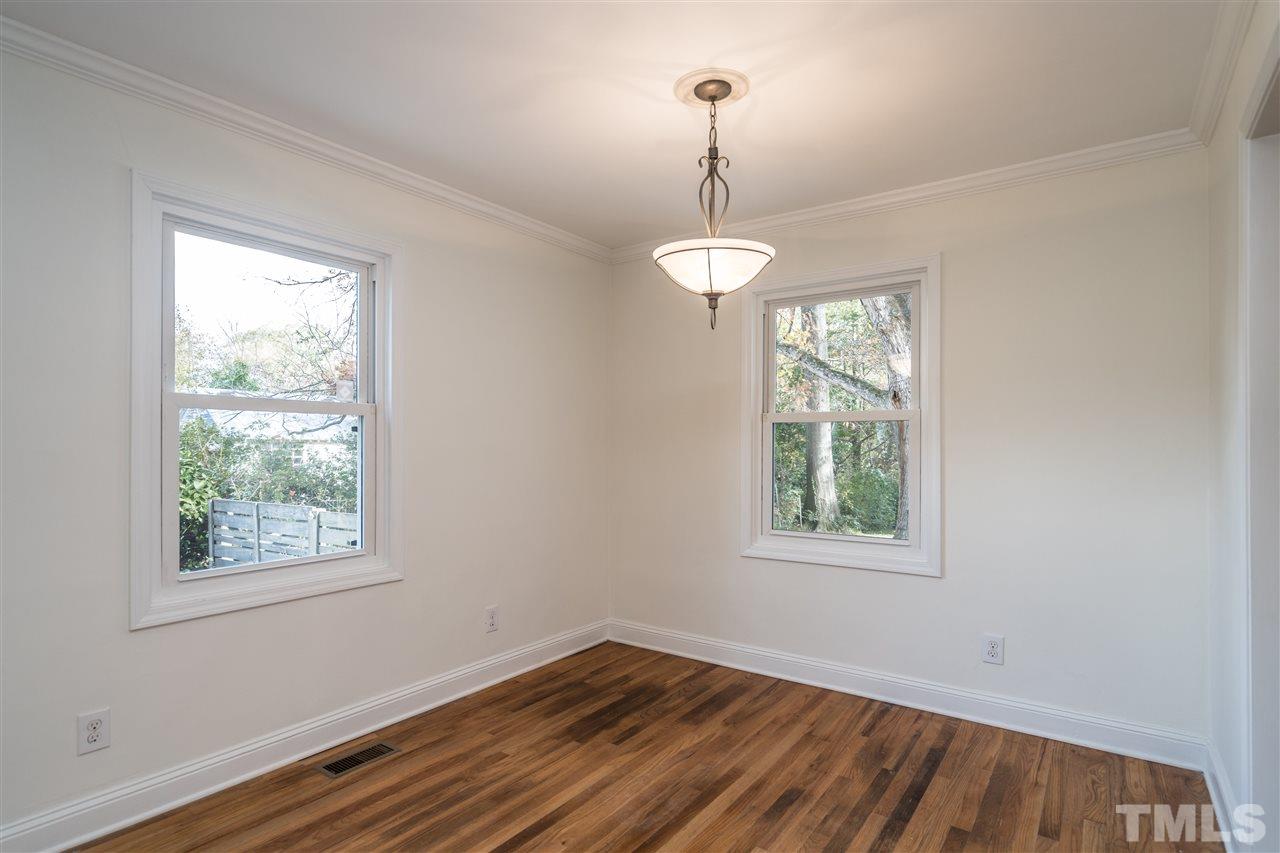 606 North King Charles Road Raleigh, NC 27610 - Photo 6 of 22 a view of empty room with window