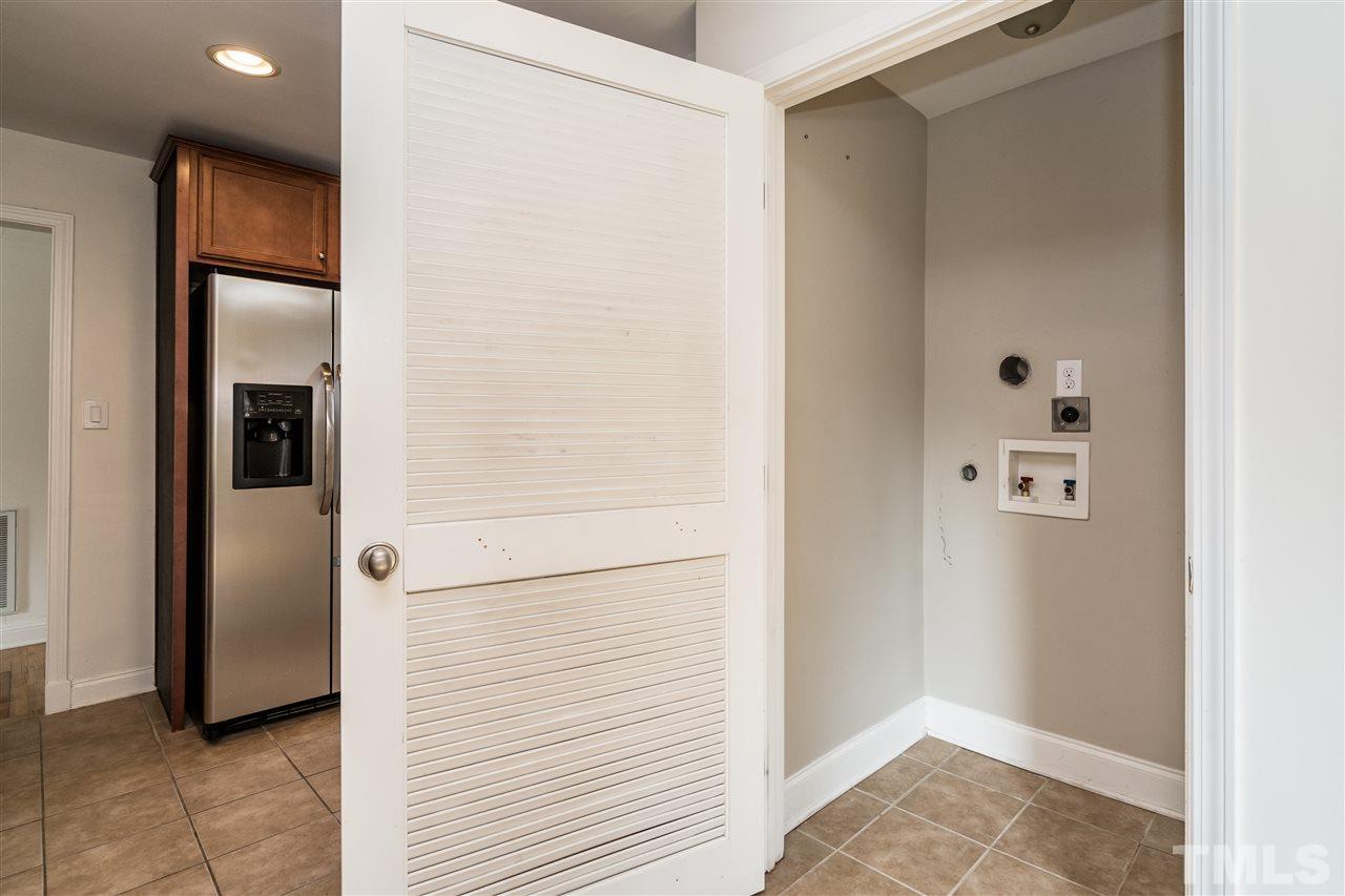 606 North King Charles Road Raleigh, NC 27610 - Photo 10 of 22 a view of elevator with hallway
