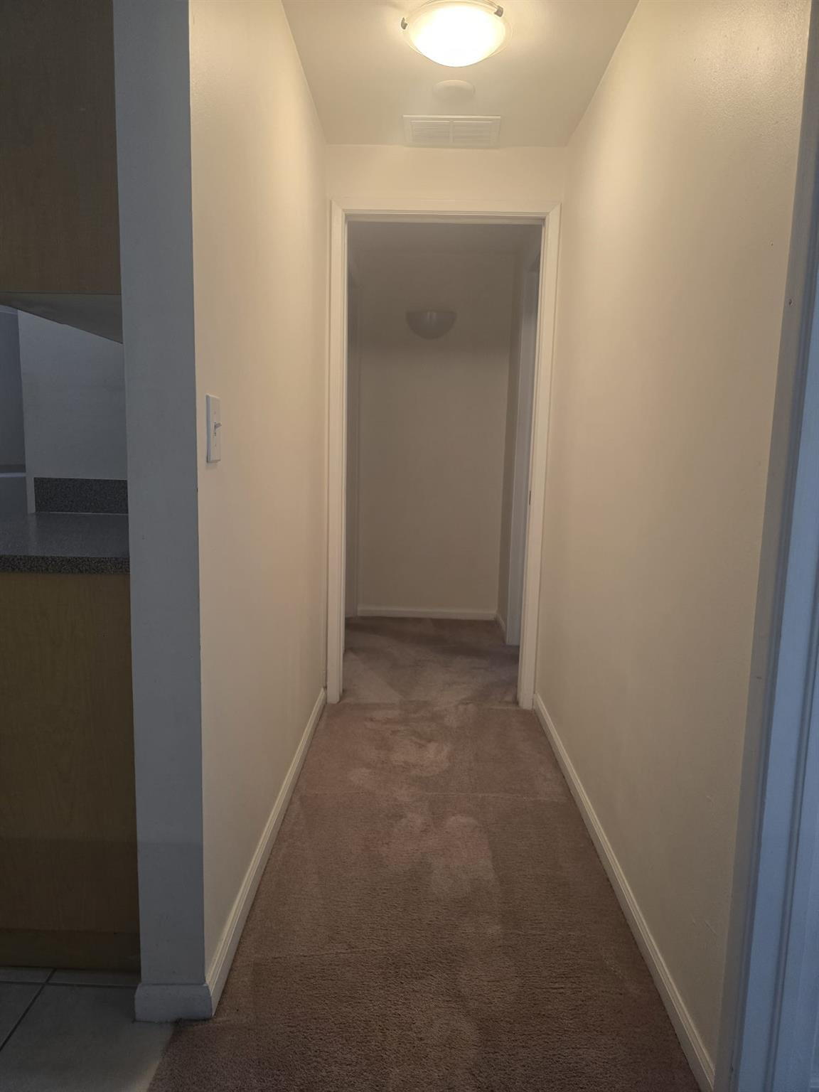 7970 North Nob Hill Road, Unit 205 Tamarac, FL 33321 - Photo 5 of 28 Hallway