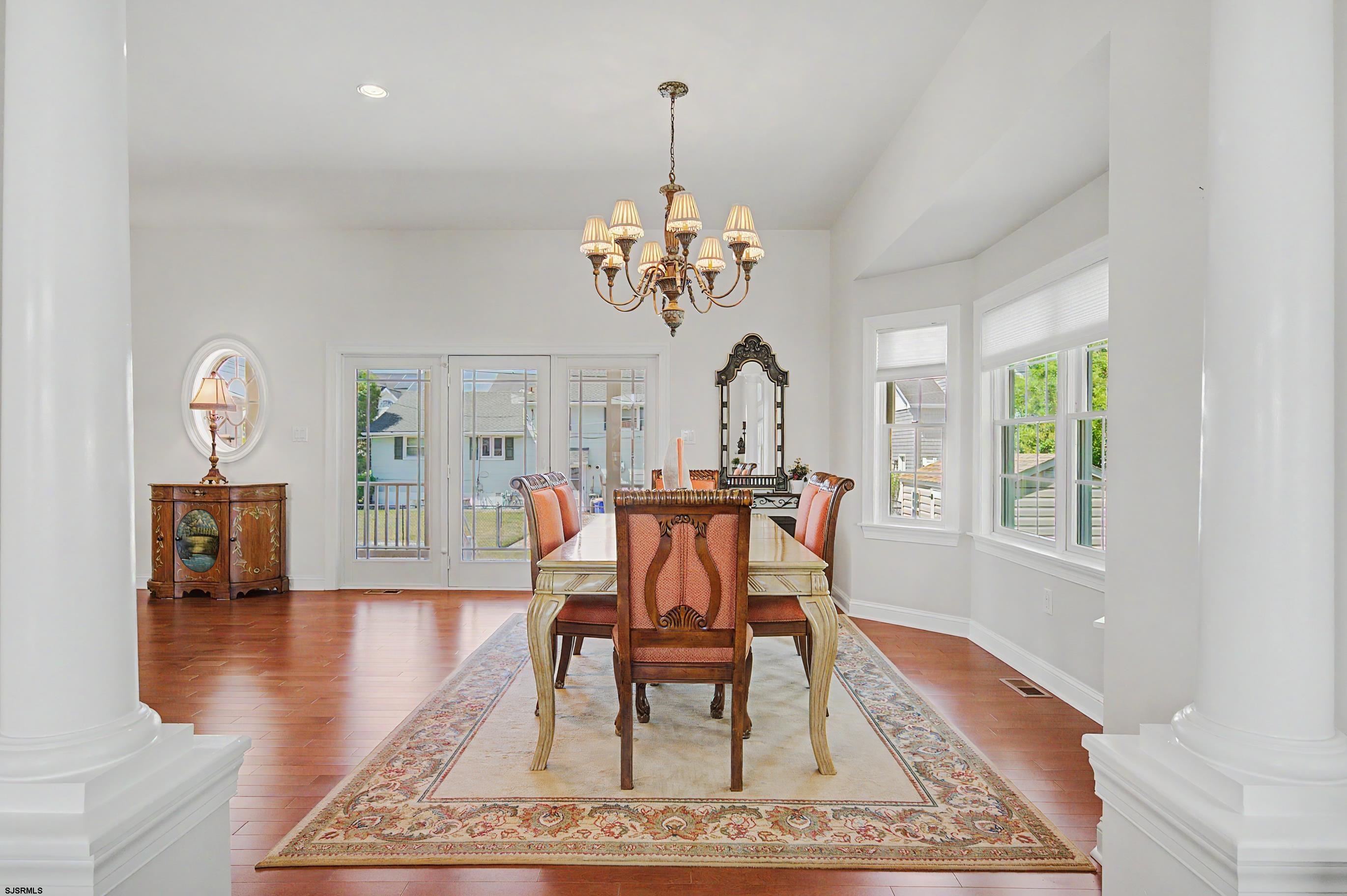 212 17th Street South Brigantine, NJ 08203 - Photo 13 of 37 a view of a dining room with furniture window and wooden floor