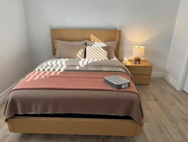 a spacious bathroom with a tub sink and shower