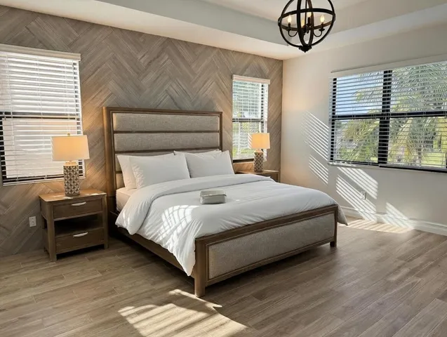 a view of a swimming pool with a yard