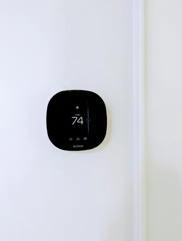 a balcony with plants and palm trees
