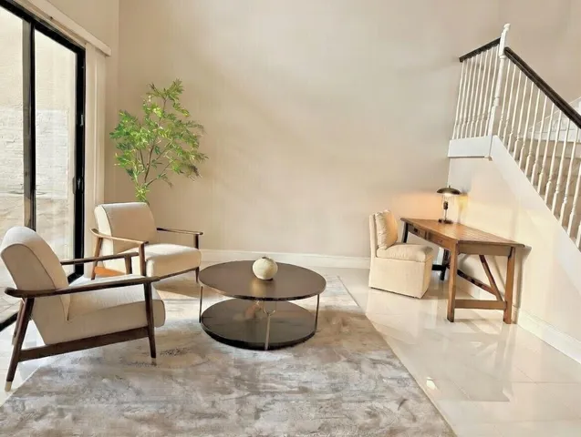 a view of a hallway with entryway