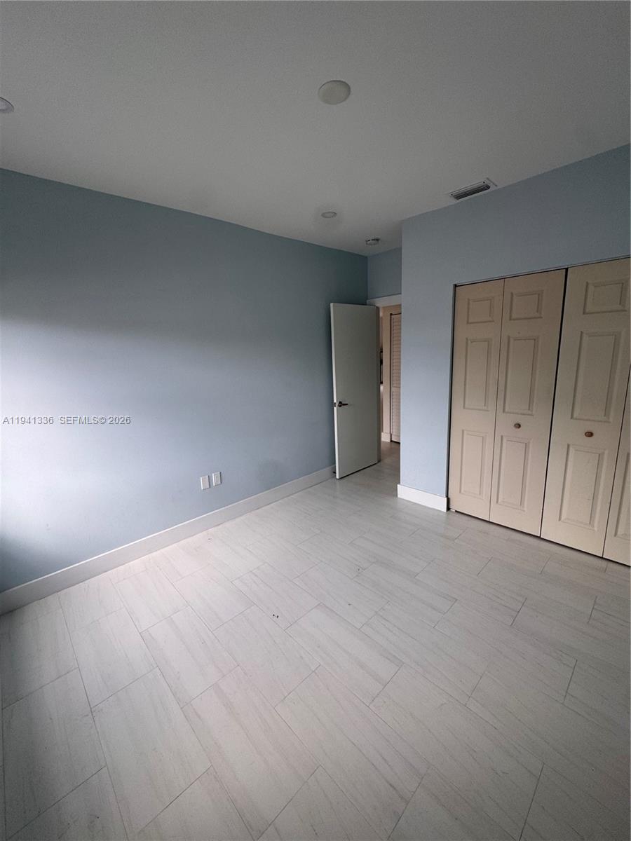 13528 Southwest 9th Lane Miami, FL 33184 - Photo 14 of 26 a view of an empty room and entryway
