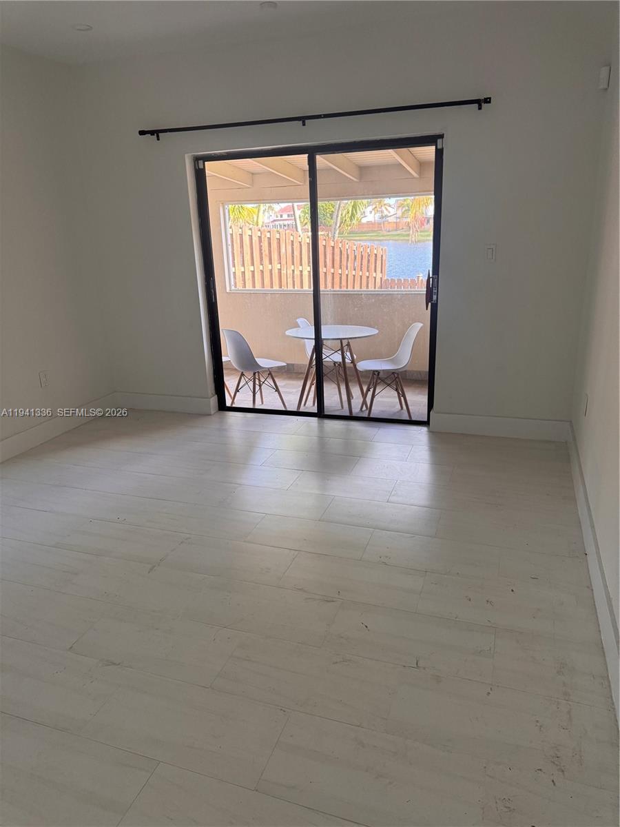 13528 Southwest 9th Lane Miami, FL 33184 - Photo 17 of 26 a view of an empty room with windows