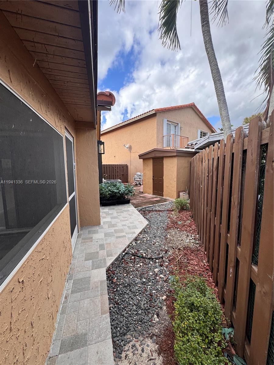 13528 Southwest 9th Lane Miami, FL 33184 - Photo 23 of 26 a porch with seating space