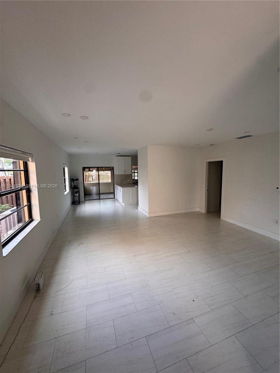 13528 Southwest 9th Lane Miami, FL 33184 - Photo 6 of 26 a view of a livingroom with furniture and staircase