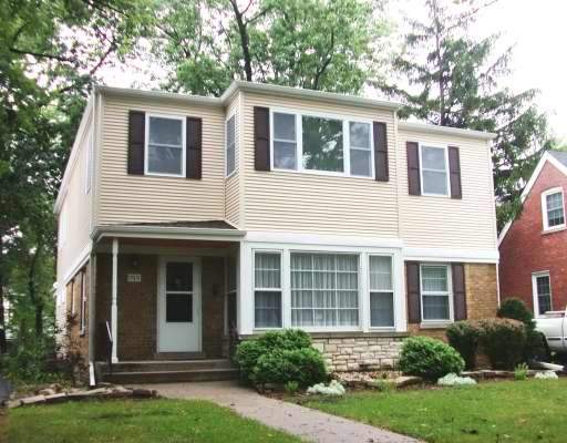 353 Des Plaines Avenue Riverside, IL 60546 - Photo 1 of 1 a view of a house with a yard and large windows