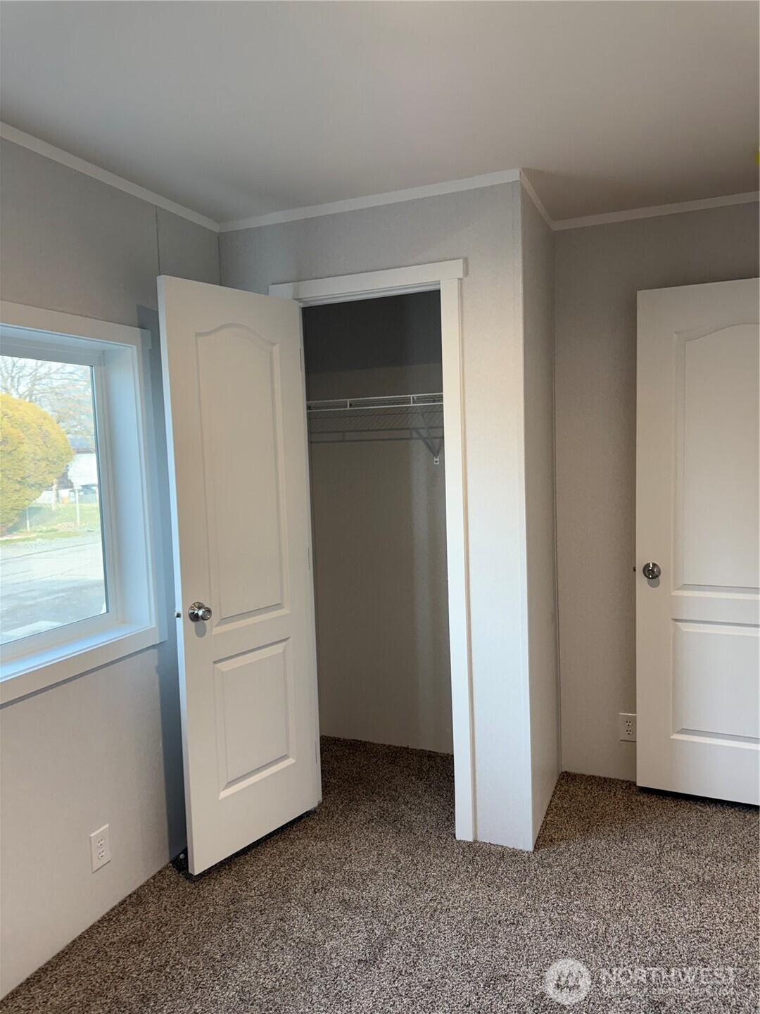 200 West Hawthorn Street, Unit 114 Connell, WA 99326 - Photo 4 of 16 an empty room with windows