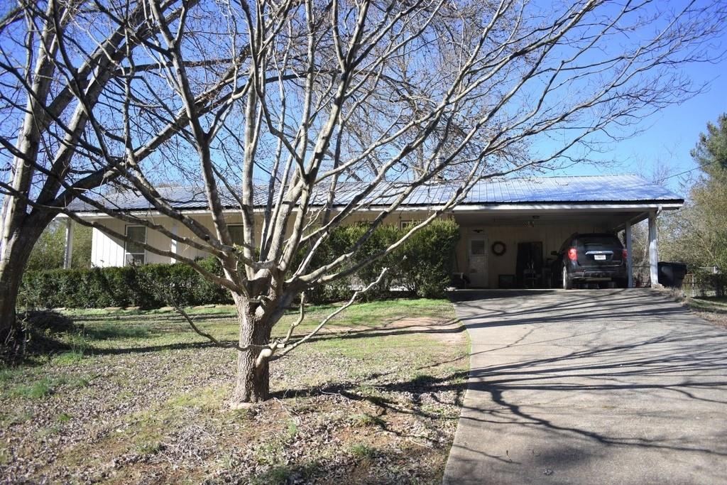 GREAT INVESTMENT OPPORTUNITY ON THIS 3 BEDROOM, 1.5 BATHROOM BRICK RANCH LOCATED ON ALMOST 1/2 ACRE LOT