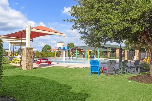 a view of a golf course with a lake